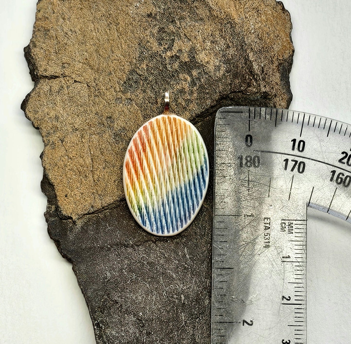 Boneyard Alaska Woolly Mammoth Ivory Colorful Rainbow Pendant