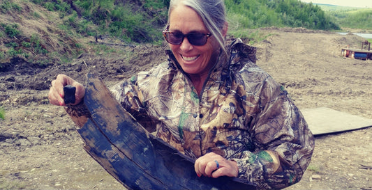 Kristin Reeves Park feeling the Mammoth Magic from a newly found piece of mammoth tusk and a cool highly burnt and carbonized toe bone.