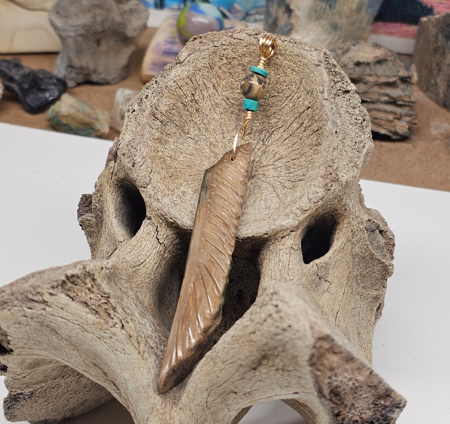 Woolly Mammoth Fossil Ivory Carved Feather Pendant with materials sourced at The Boneyard Alaska by Kristin at KRP Ice Age Treasures