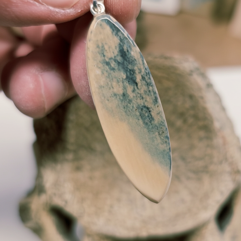 Close-up Woolly Mammoth Ivory Pendant with heavy Vivianite Blue Stains