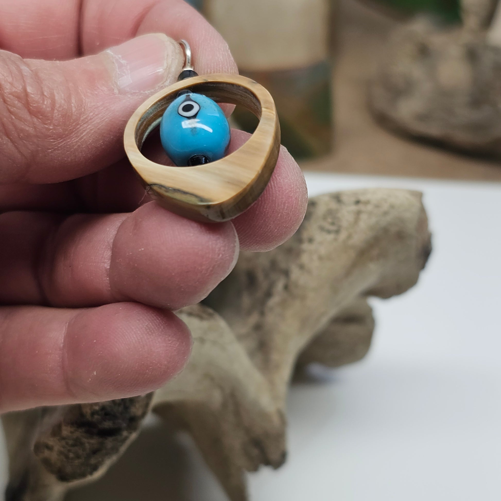 Woolly Mammoth Ivory Third Eye Pendant detail — unique color and texture from Ice Age fossil ivory