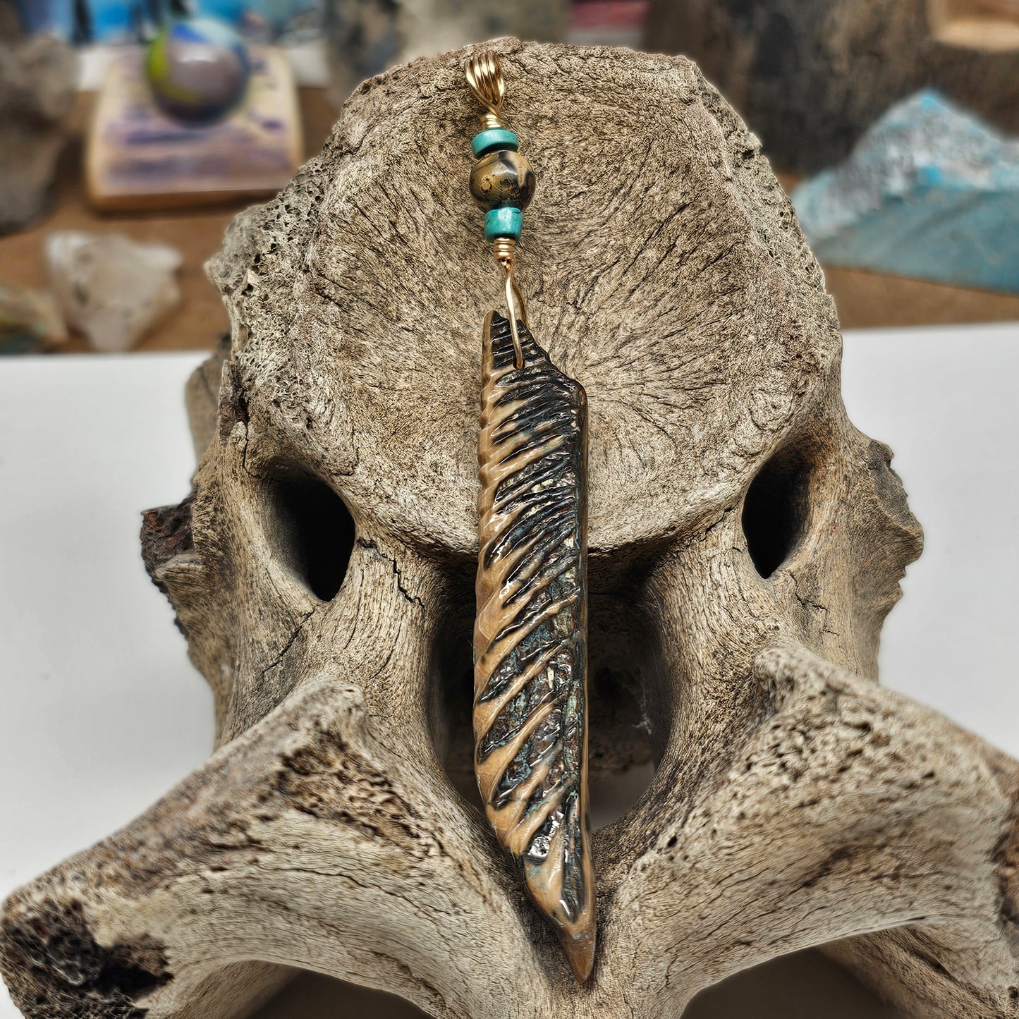 Woolly Mammoth Fossil Ivory Carved Feather Pendant with materials sourced at The Boneyard Alaska by Kristin at KRP Ice Age Treasures
