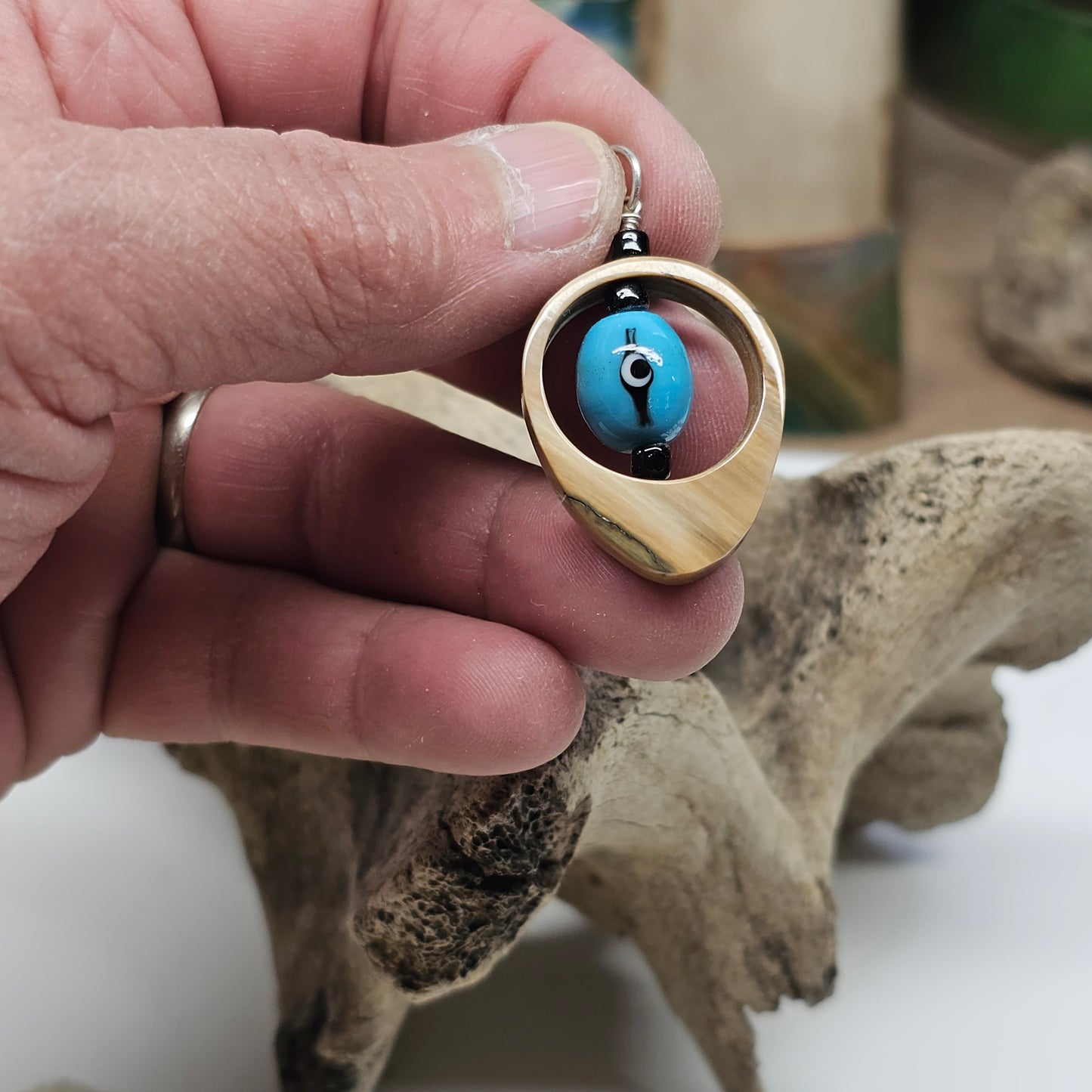 Woolly Mammoth Fossil Ivory Third Eye Pendant with vintage 1960s spinning bead on sterling silver hardware