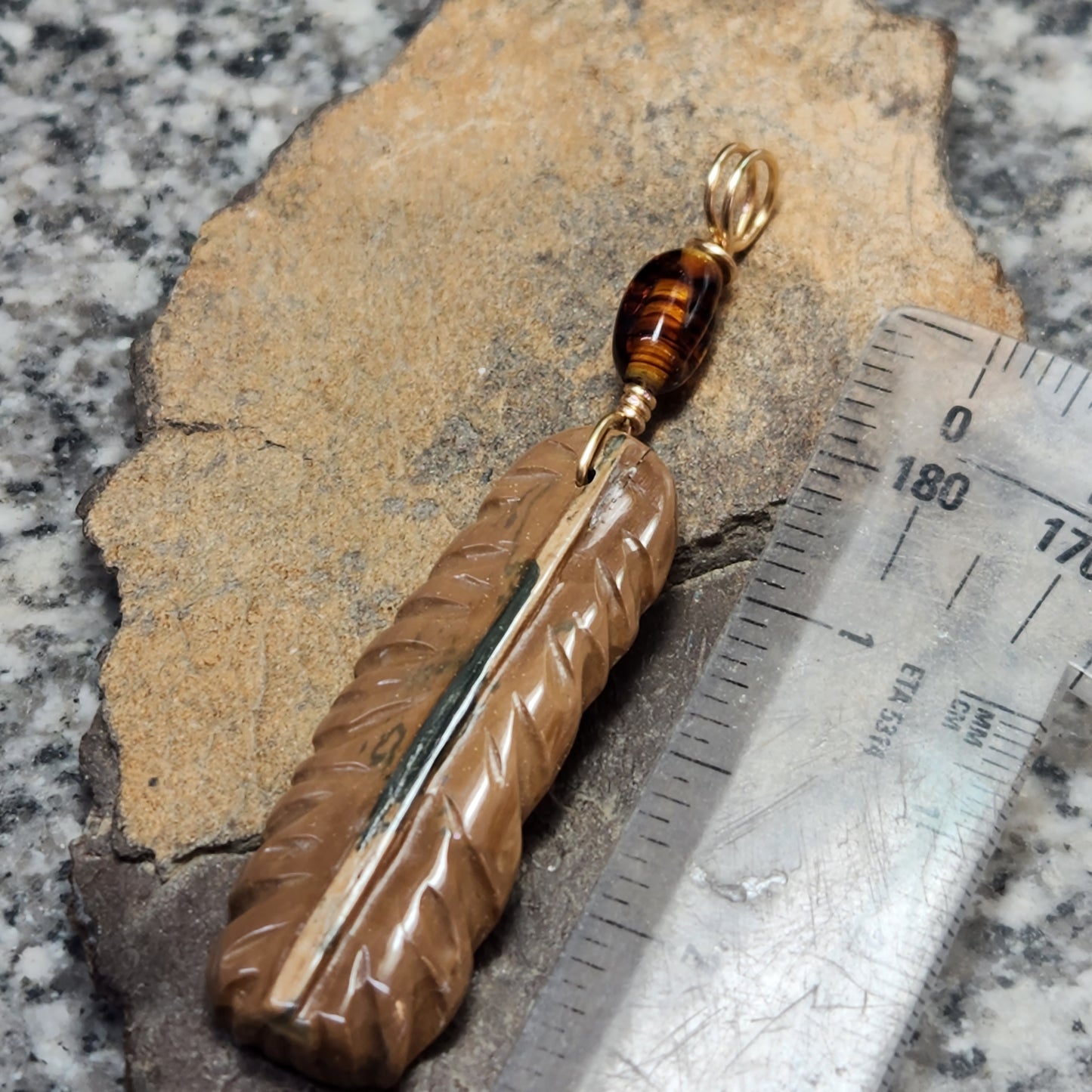 Woolly Mammoth Ivory Feather Pendant
